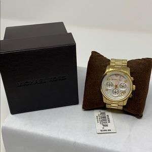 Michael Kors gold watch mother of pearl face
